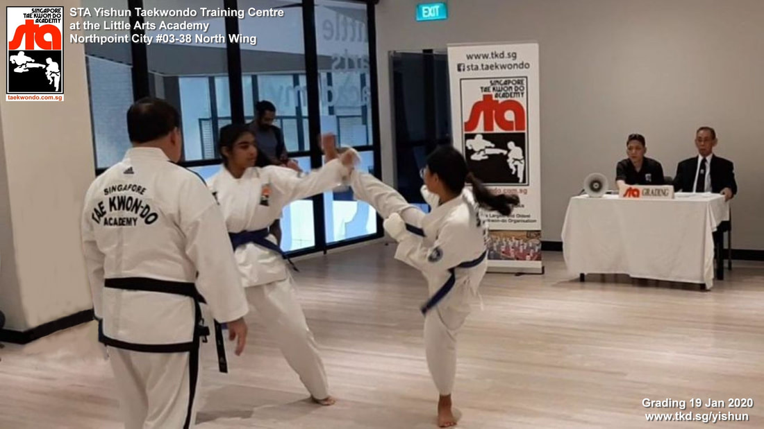 Turning Kick Free Sparring Grading Alluyise Sonakshi Yishun Northpoint Singapore Taekwondo Academy STA Adrian Huan Sembawang